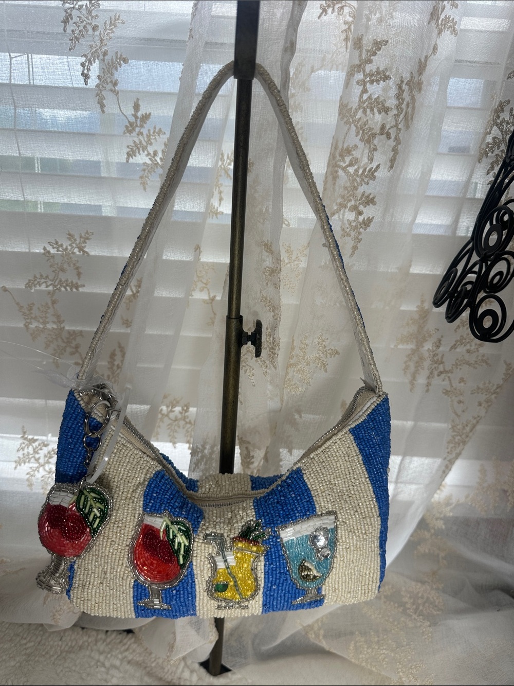Made in India beaded cocktail drink design on blue and white  shoulder bag